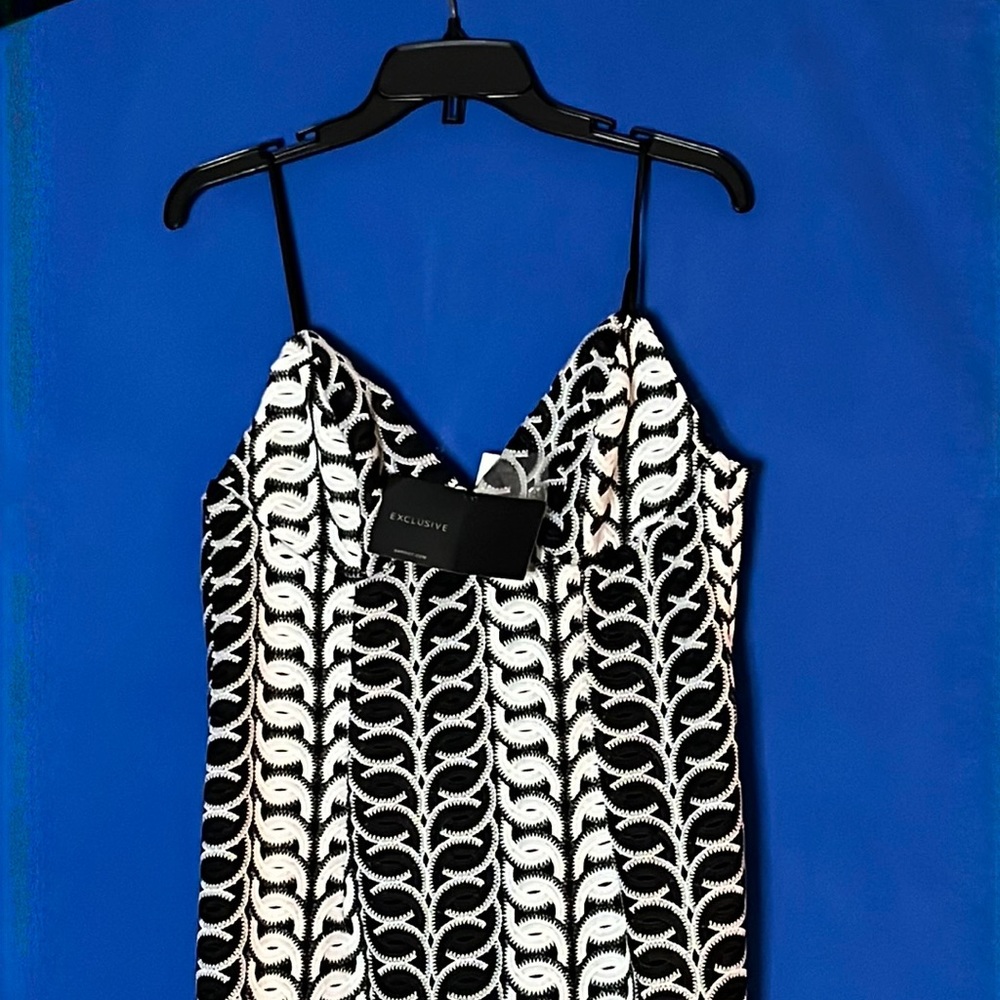 Brand new never worn Exclusive Bardot cocktail dress. Size 8